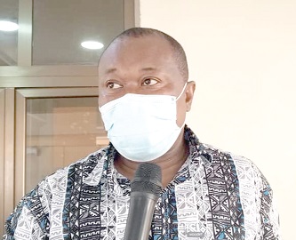  Dr Edmund Ekow Kaitoo, New Juaben South Municipal Health Director, addressing health workers in Koforidua